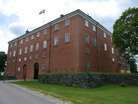 Västerås slott, stor röd tegelbyggnad.